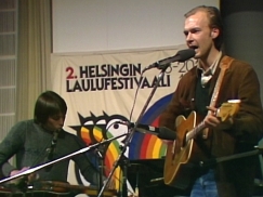 Kuva: Olli Haavisto ja Hande Nurmio Helsingin laulufestivaalin konsertissa (1977). Yle kuvanauha.