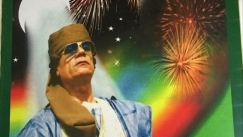 Kuva: Gaddafia ylistv juliste (2004) Yle kuvanauha